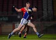 30 October 2021; Peter Teague of Dromore in action against Daire Gallagher of Trillick during the Tyrone County Senior Football Championship Semi-Final match between Dromore and Trillick at Healy Park in Omagh, Tyrone. Photo by Ramsey Cardy/Sportsfile