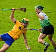 31 October 2021; Sean Baxter of Na Fianna in action against Charlie Keher of Lucan Sarsfields during the Go Ahead Dublin County Senior Club Hurling Championship Semi-Final match between Lucan Sarsfields and Na Fianna at Parnell Park in Dublin. Photo by Ray McManus/Sportsfile