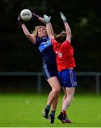 31 October 2021; Roisin Connolly of St Jude's in action against Laura Bourke of Clontarf B during the Dublin LGFA Go-Ahead Junior Club Football Championship Final match between Clontarf B and St Judes at St Margarets GAA club in Dublin. Photo by Brendan Moran/Sportsfile