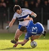 31 October 2021; Bryan Horisk of Errigal Ciaran in action against Cormac O'Hagan of Coalisland during the Tyrone County Senior Football Championship Semi-Final match between Errigal Ciaran and Coalisland at Pomeroy Plunkett's GAA Club in Tyrone. Photo by Ramsey Cardy/Sportsfile