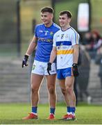 31 October 2021; Michael McKernan of Coalisland and Darragh Canavan of Errigal Ciaran during the Tyrone County Senior Football Championship Semi-Final match between Errigal Ciaran and Coalisland at Pomeroy Plunkett's GAA Club in Tyrone. Photo by Ramsey Cardy/Sportsfile