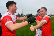 31 October 2021; Padraig Pearses players Aaron Feehily, left, and Mark Richardson celebrate after their side's victory in the Roscommon County Senior Club Football Championship Final match between Clann na nGael and Padraig Pearses at Dr Hyde Park in Roscommon. Photo by Seb Daly/Sportsfile
