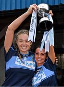 31 October 2021; St Jude's co-captains Aoife Keyes, left, and Aoife Rocket lift the cup after the Dublin LGFA Go-Ahead Junior Club Football Championship Final match between Clontarf B and St Judes at St Margarets GAA club in Dublin. Photo by Brendan Moran/Sportsfile