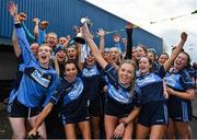 31 October 2021; St Jude's co-captains Aoife Rocket and Aoife Keyes lift the cup as they celebrate with their team-mates after the Dublin LGFA Go-Ahead Junior Club Football Championship Final match between Clontarf B and St Judes at St Margarets GAA club in Dublin. Photo by Brendan Moran/Sportsfile