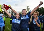 31 October 2021; St Jude's players , from left, Lisa Morris, Aoife Keyes and Laura Doherty celebrate after the Dublin LGFA Go-Ahead Junior Club Football Championship Final match between Clontarf B and St Judes at St Margarets GAA club in Dublin. Photo by Brendan Moran/Sportsfile