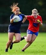 31 October 2021; Aisling Gannon of St Jude's in action against Lizzie O'Callaghan of Clontarf B during the Dublin LGFA Go-Ahead Junior Club Football Championship Final match between Clontarf B and St Judes at St Margarets GAA club in Dublin. Photo by Brendan Moran/Sportsfile