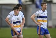 31 October 2021; Errigal Ciaran players, from left, Ruairi Canavan, Aidan McCrory and Ben McDonnell dejected after the Tyrone County Senior Football Championship Semi-Final match between Errigal Ciaran and Coalisland at Pomeroy Plunkett's GAA Club in Tyrone. Photo by Ramsey Cardy/Sportsfile