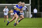 31 October 2021; Caitlin Coffey of Castleknock in action against Nicole Owens of St Sylvesters during the Dublin LGFA Go-Ahead Intermediate Club Football Championship Final match between St Sylvesters and Castleknock at St Margarets GAA club in Dublin. Photo by Brendan Moran/Sportsfile