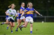 31 October 2021; Orlaith Higgins of Castleknock in action against Grace Twomey of St Sylvesters during the Dublin LGFA Go-Ahead Intermediate Club Football Championship Final match between St Sylvesters and Castleknock at St Margarets GAA club in Dublin. Photo by Brendan Moran/Sportsfile