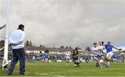 31 October 2021; Brian Toner of Coalisland shoots to score his side's third goal despite the efforts of Errigal Ciaran goalkeeper Darragh McAnenly and Joseph Oguz during the Tyrone County Senior Football Championship Semi-Final match between Errigal Ciaran and Coalisland at Pomeroy Plunkett's GAA Club in Tyrone. Photo by Ramsey Cardy/Sportsfile