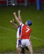 31 October 2021; Bill O’Carroll of Kilmacud Crokes and Sean Moran of Cuala reach for the sliotar during the Go Ahead Dublin County Senior Club Hurling Championship Semi-Final match between Cuala and Kilmacud Crokes at Parnell Park in Dublin. Photo by Ray McManus/Sportsfile