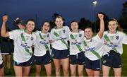 31 October 2021; The St Sylvesters players, from left, Leah Harrold, Lisa Murphy, Aine McDonnell Kim White, Niamh Harney and Louise Ryan celebrate after the Dublin LGFA Go-Ahead Intermediate Club Football Championship Final match between St Sylvesters and Castleknock at St Margarets GAA club in Dublin. Photo by Brendan Moran/Sportsfile