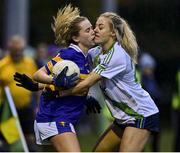 31 October 2021; Caitlin Coffey of Castleknock is tackled by Nicole Owens of St Sylvesters during the Dublin LGFA Go-Ahead Intermediate Club Football Championship Final match between St Sylvesters and Castleknock at St Margarets GAA club in Dublin. Photo by Brendan Moran/Sportsfile