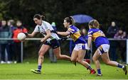 31 October 2021; Niamh McEvoy of St Sylvesters in action against Laura Carolan of Castleknock during the Dublin LGFA Go-Ahead Intermediate Club Football Championship Final match between St Sylvesters and Castleknock at St Margarets GAA club in Dublin. Photo by Brendan Moran/Sportsfile