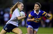 31 October 2021; Katie O’Sullivan of St Sylvesters in action against Tara King of Castleknock during the Dublin LGFA Go-Ahead Intermediate Club Football Championship Final match between St Sylvesters and Castleknock at St Margarets GAA club in Dublin. Photo by Brendan Moran/Sportsfile