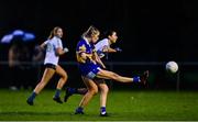 31 October 2021; Hannan Hanlon of Castleknock in action against Leah Harrold of St Sylvesters during the Dublin LGFA Go-Ahead Intermediate Club Football Championship Final match between St Sylvesters and Castleknock at St Margarets GAA club in Dublin. Photo by Brendan Moran/Sportsfile