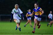 31 October 2021; Emma Sullivan of St Sylvesters in action against Laura Carolan of Castleknock during the Dublin LGFA Go-Ahead Intermediate Club Football Championship Final match between St Sylvesters and Castleknock at St Margarets GAA club in Dublin. Photo by Brendan Moran/Sportsfile