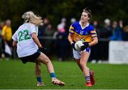 31 October 2021; Laura Carolan of Castleknock in action against Nicole Owens of St Sylvesters during the Dublin LGFA Go-Ahead Intermediate Club Football Championship Final match between St Sylvesters and Castleknock at St Margarets GAA club in Dublin. Photo by Brendan Moran/Sportsfile