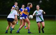 31 October 2021; Aisling O'Connor of Castleknock in action against Danielle Lawless, left, and Emma Lynch of St Sylvesters during the Dublin LGFA Go-Ahead Intermediate Club Football Championship Final match between St Sylvesters and Castleknock at St Margarets GAA club in Dublin. Photo by Brendan Moran/Sportsfile