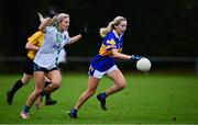 31 October 2021; Caitlin Coffey of Castleknock in action against Nicole Owens of St Sylvesters during the Dublin LGFA Go-Ahead Intermediate Club Football Championship Final match between St Sylvesters and Castleknock at St Margarets GAA club in Dublin. Photo by Brendan Moran/Sportsfile