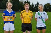 31 October 2021; Referee Lorraine O'Sullivan with team captains Jenny Hickey of Castleknock and Danielle Lawless of St Sylvesters before the Dublin LGFA Go-Ahead Intermediate Club Football Championship Final match between St Sylvesters and Castleknock at St Margarets GAA club in Dublin. Photo by Brendan Moran/Sportsfile