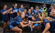 31 October 2021; The St Jude's team celebrate with the cup after the Dublin LGFA Go-Ahead Junior Club Football Championship Final match between Clontarf B and St Judes at St Margarets GAA club in Dublin. Photo by Brendan Moran/Sportsfile