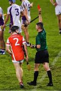 31 October 2021; Referee Sean Stack shows a red card to Michael Conroy of Cuala in the last minute of the Go Ahead Dublin County Senior Club Hurling Championship Semi-Final match between Cuala and Kilmacud Crokes at Parnell Park in Dublin. Photo by Ray McManus/Sportsfile