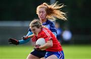 31 October 2021; Roisin McCaffrey of Clontarf B is tackled by Leah Butler of St Jude's during the Dublin LGFA Go-Ahead Junior Club Football Championship Final match between Clontarf B and St Judes at St Margarets GAA club in Dublin. Photo by Brendan Moran/Sportsfile