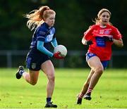 31 October 2021; Leah Butler of St Jude's in action against Amy O’Boyle of Clontarf B during the Dublin LGFA Go-Ahead Junior Club Football Championship Final match between Clontarf B and St Judes at St Margarets GAA club in Dublin. Photo by Brendan Moran/Sportsfile