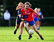 31 October 2021; Maeve Walsh of Clontarf B in action against Aisling Gannon of St Jude's during the Dublin LGFA Go-Ahead Junior Club Football Championship Final match between Clontarf B and St Judes at St Margarets GAA club in Dublin. Photo by Brendan Moran/Sportsfile