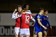 1 November 2021; Jason McClelland of St Patrick's Athletic, left, celebrates with team-mates Matty Smith, 12, and Nahum Melvin-Lambert after scoring their side's second goal during the SSE Airtricity League Premier Division match between St Patrick's Athletic and Bohemians at Richmond Park in Dublin. Photo by Seb Daly/Sportsfile