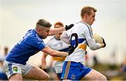 31 October 2021; Mark Kavanagh of Errigal Ciaran in action against Eoghan Hampsey of Coalisland during the Tyrone County Senior Football Championship Semi-Final match between Errigal Ciaran and Coalisland at Pomeroy Plunkett's GAA Club in Tyrone. Photo by Ramsey Cardy/Sportsfile