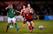 26 October 2021; Marie Höbinger of Austria in action against Marissa Callaghan of Northern Ireland during the FIFA Women's World Cup 2023 qualifying group D match between Northern Ireland and Austria at Seaview in Belfast. Photo by Ramsey Cardy/Sportsfile