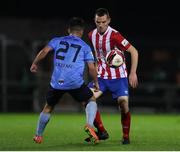 3 November 2021; Mark Walsh of Treaty United in action against Sean Brennan of UCD during the SSE Airtricity League First Division Play-Off Semi-Final 1st leg match between Treaty United and UCD at Markets Field in Limerick. Photo by Michael P Ryan/Sportsfile