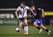 29 October 2021; David McMillan of Dundalk and Niall O'Keeffe of Waterford during the SSE Airtricity League Premier Division match between Dundalk and Waterford at Oriel Park in Dundalk, Louth. Photo by Ben McShane/Sportsfile