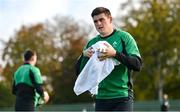 3 November 2021; Dan Sheehan dries a rugby ball during Ireland rugby squad training at Carton House in Maynooth, Kildare. Photo by Brendan Moran/Sportsfile
