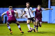 4 November 2021; Cameron Dummigan of Dundalk and Ronan Murray of Drogheda United during the SSE Airtricity League Premier Division match between Drogheda United and Dundalk at Head in the Game Park in Drogheda, Louth. Photo by Ben McShane/Sportsfile