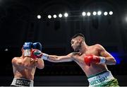 5 November 2021; James McGivern, right, and Rustem Fatkhullin during their lightweight bout at the Ulster Hall in Belfast. Photo by Ramsey Cardy/Sportsfile