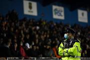 5 November 2021; A member of An Garda Síochána patrols during the SSE Airtricity League Premier Division match between Waterford and Shamrock Rovers at the RSC in Waterford. Photo by Seb Daly/Sportsfile