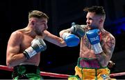 5 November 2021; Sean McComb, left, and Ronnie Clark during their lightweight bout at the Ulster Hall in Belfast. Photo by Ramsey Cardy/Sportsfile