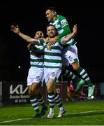 5 November 2021; Sean Hoare of Shamrock Rovers, centre, celebrates with team-mates Roberto Lopes, left, and Aaron Greene after scoring their side's second goal during the SSE Airtricity League Premier Division match between Waterford and Shamrock Rovers at the RSC in Waterford. Photo by Seb Daly/Sportsfile