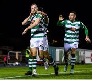 5 November 2021; Sean Hoare of Shamrock Rovers, left, celebrates with team-mates Roberto Lopes, hidden, and Aaron Greene, right, after scoring their side's second goal during the SSE Airtricity League Premier Division match between Waterford and Shamrock Rovers at the RSC in Waterford. Photo by Seb Daly/Sportsfile