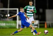 5 November 2021; Graham Burke of Shamrock Rovers in action against Niall O'Keeffe of Waterford during the SSE Airtricity League Premier Division match between Waterford and Shamrock Rovers at the RSC in Waterford. Photo by Seb Daly/Sportsfile