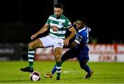 5 November 2021; Roberto Lopes of Shamrock Rovers in action against Isaac Tshipamba of Waterford during the SSE Airtricity League Premier Division match between Waterford and Shamrock Rovers at the RSC in Waterford. Photo by Seb Daly/Sportsfile