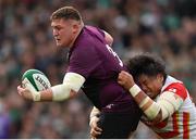 6 November 2021; Tadhg Furlong of Ireland is tackled by Atsushi Sakate of Japan during the Autumn Nations Series match between Ireland and Japan at Aviva Stadium in Dublin. Photo by Ramsey Cardy/Sportsfile