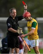 6 November 2021; Niall Healy of Craughwell is shown a straight red card by referee Conor Quinlan during the Galway County Senior Club Hurling Championship semi-final match between Craughwell and Clarinbridge at Kenny Park in Athenry, Galway. Photo by Piaras Ó Mídheach/Sportsfile