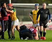 6 November 2021; Niall Healy of Craughwell tussles with Clarinbridge substitute Alan Kerins, far left, before Healy was shown a straight red card by referee Conor Quinlan during the Galway County Senior Club Hurling Championship semi-final match between Craughwell and Clarinbridge at Kenny Park in Athenry, Galway. Photo by Piaras Ó Mídheach/Sportsfile