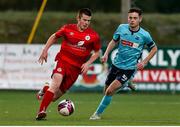 6 November 2021; Luke Browne of Shelbourne in action against Louis Allman of Cobh Ramblers during the EA SPORTS U17 National League of Ireland Shield Final match between Shelbourne and Cobh Ramblers at Athlone Town Stadium in Athlone, Westmeath. Photo by Michael P Ryan/Sportsfile