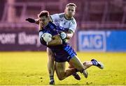 6 November 2021; Mark Sweeney of St Jude's is tackled by Sean Cleary of Lucan Sarsfields during the Go Ahead Dublin County Senior Club Football Championship Semi-Final match between St Jude's and Lucan Sarsfields at Parnell Park in Dublin. Photo by Sam Barnes/Sportsfile