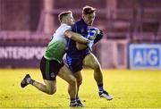 6 November 2021; Mark Sweeney of St Jude's is tackled by Sean Cleary of Lucan Sarsfields during the Go Ahead Dublin County Senior Club Football Championship Semi-Final match between St Jude's and Lucan Sarsfields at Parnell Park in Dublin. Photo by Sam Barnes/Sportsfile